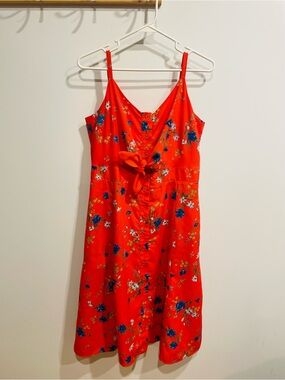 Vibrant Red Dress with Blue Floral Accents